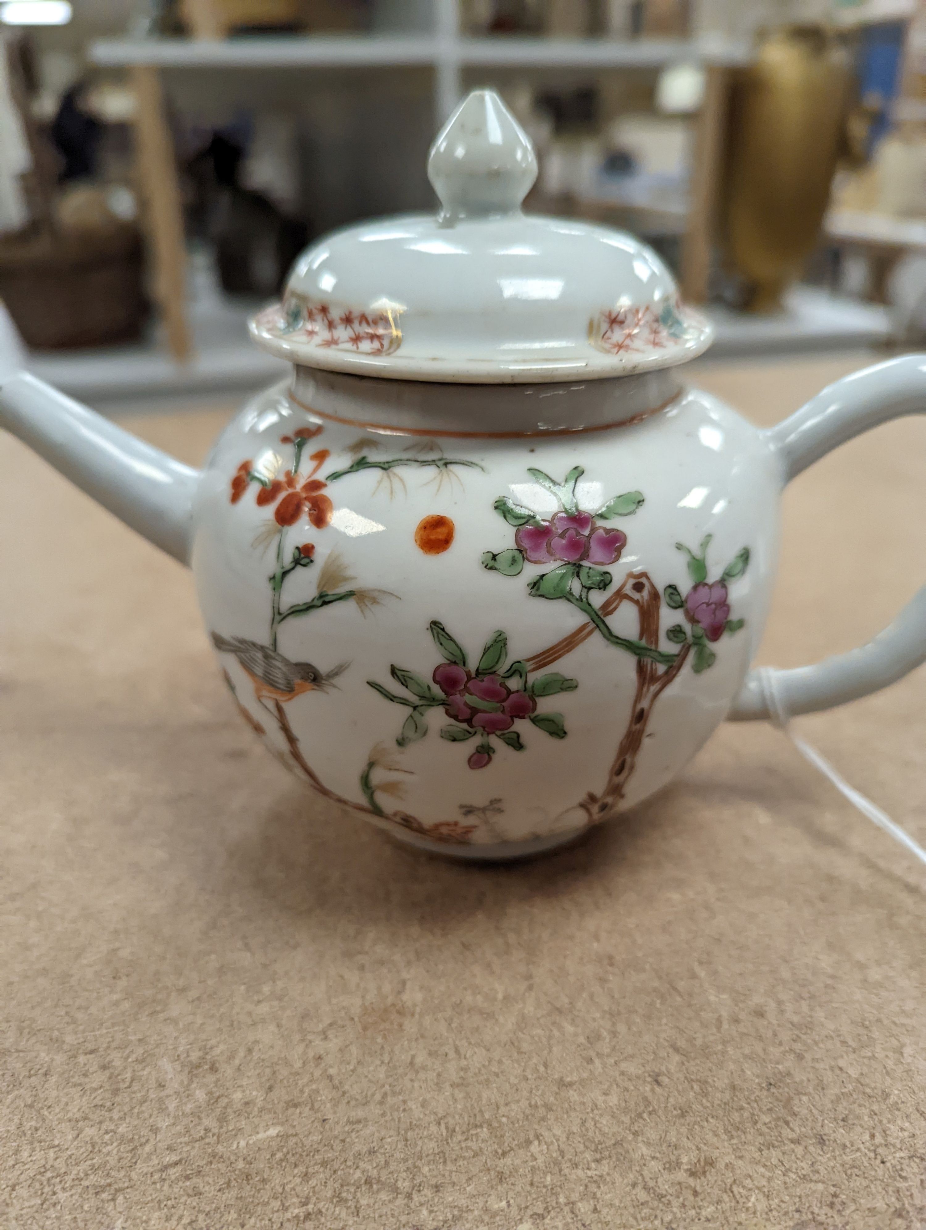 An 18th century Chinese famille rose teapot and associated cover 13cm
